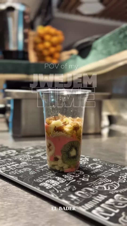 A layered fruit cup on the counter at Restaurant El Bader